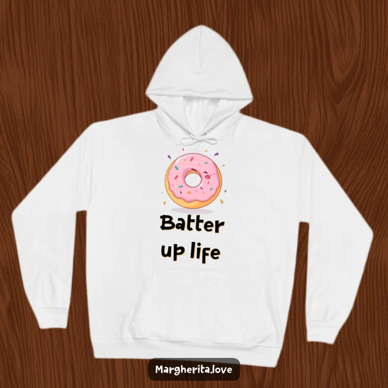 Funny donut hoodie showcasing a delighted donut in a joyful spin, offering warmth and a humorous, happy vibe.