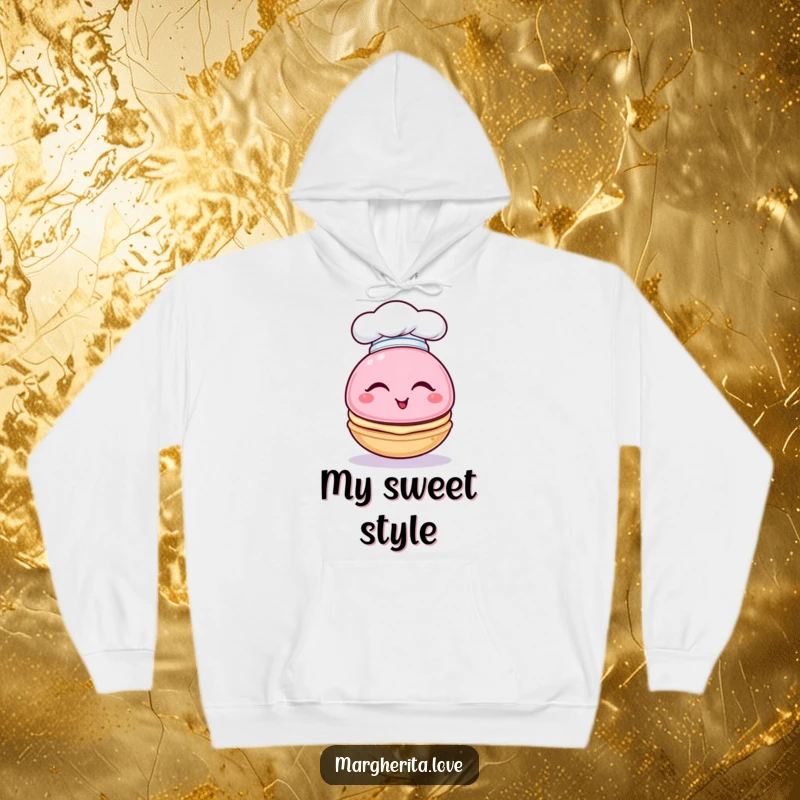 Funny hoodie featuring a winking macaron character wearing a tiny chef hat, embodying culinary cuteness and humor.