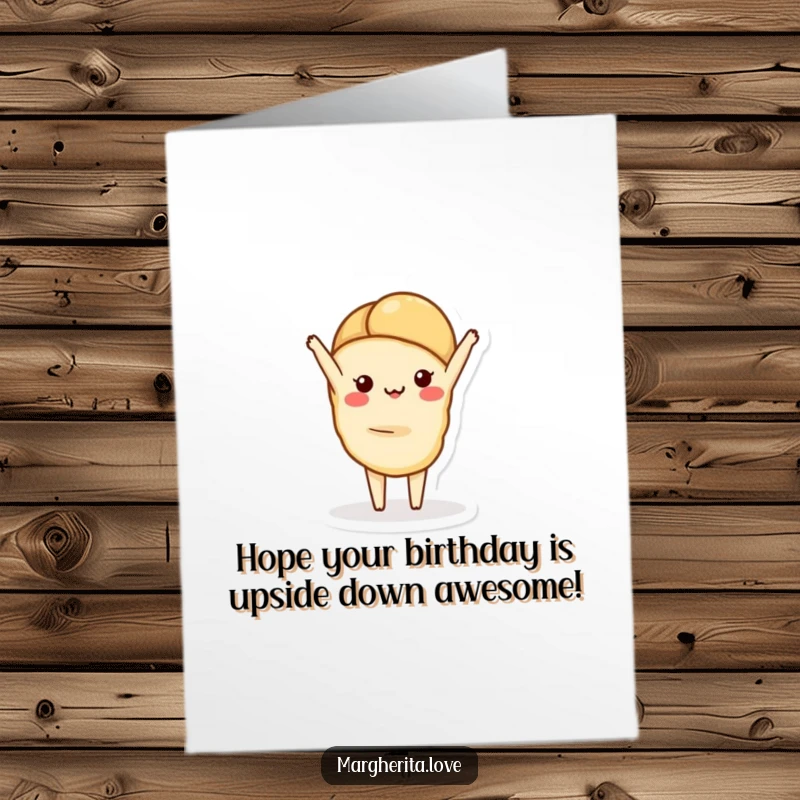 Funny free printable birthday card: a charming croissant balances in a handstand, offering a whimsical and humorous greeting.