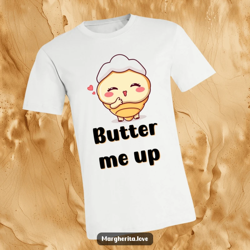 Funny t-shirt showcasing a winking croissant character blowing a kiss, perfect for spreading joy and adding a touch of whimsy.