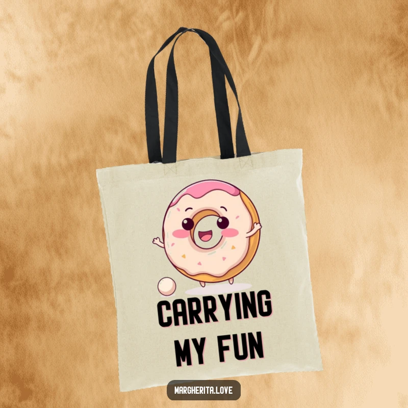 Funny donut tote bag showing a happy, delighted donut character bouncing a tiny ball, perfect for shopping.